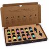 A colorful aromatherapy essential oil set with ten scented bottles in a brown cardboard gift box with black caps
