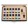 Set of ten 5ml aromatherapy essential oil bottles with colorful labels and black caps in a cardboard box essential oil set