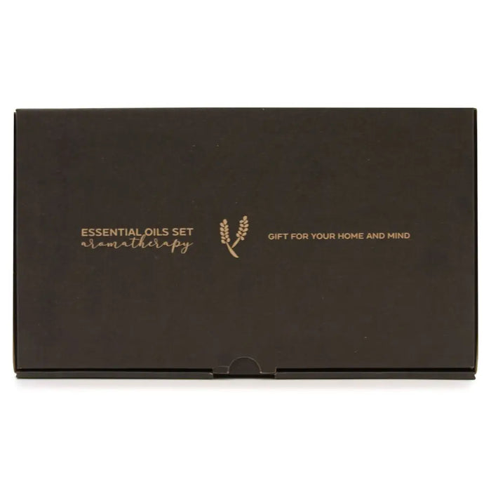Black rectangular essential oil set box with gold foil lettering and wheat emblem for aromatherapy at home and mind