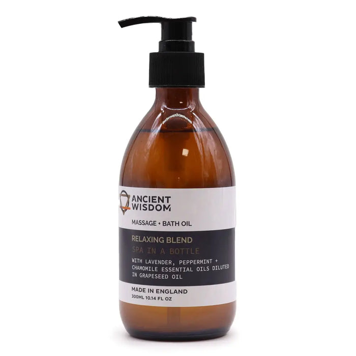 A sleek amber glass bottle with black pump labeled ancient wisdom massage and bath oil with chamomile and grapeseed oils