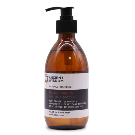A sleek amber glass bottle of aromatherapy massage and bath oil with clary sage essential and grapeseed oil