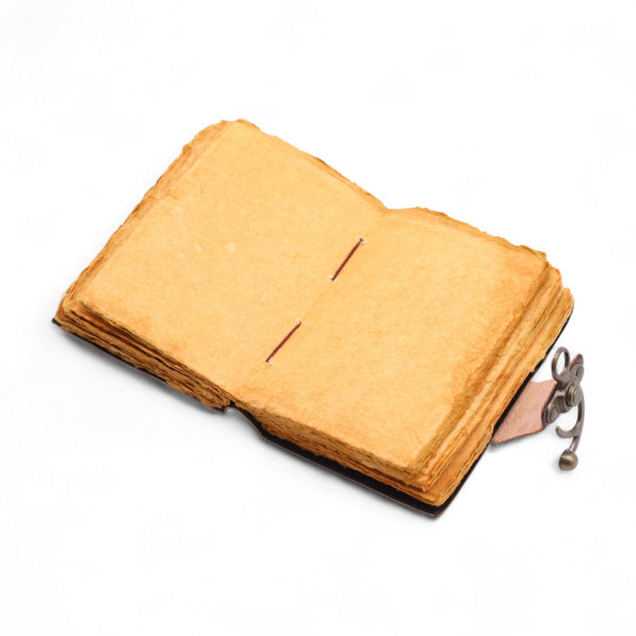 Leder Notizbuch – Das Buch der ungesagten Geschichten, Büttenrand (15x10cm)