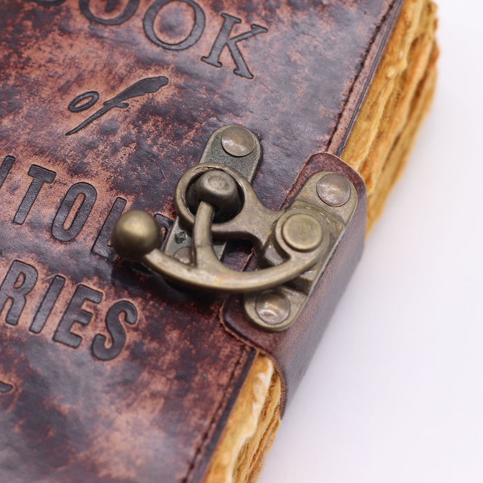 Leder Notizbuch – Das Buch der ungesagten Geschichten, Büttenrand (15x10cm)