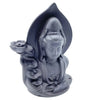 Gray ceramic backflow incense burner shaped like serene buddha with flowing robes holding a lotus flower