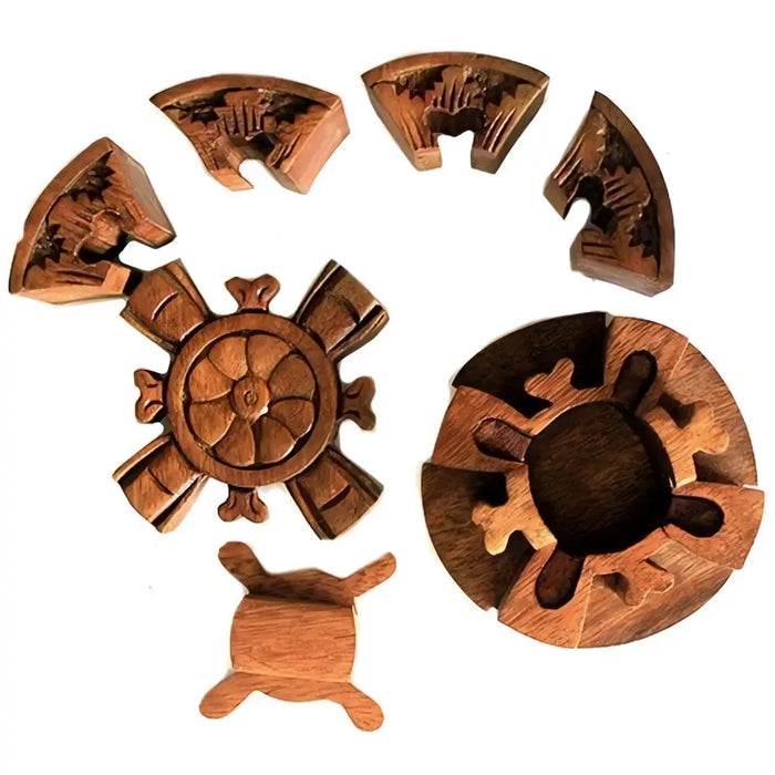 Bali magic box wooden puzzle in natural wood with carved ship wheel and turtle designs in a round petal shape