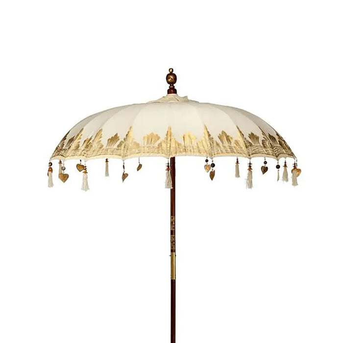Bali patio parasol in natural cream canvas with gold mountain embroidery and heart-shaped tassels, 1.5 meters wide
