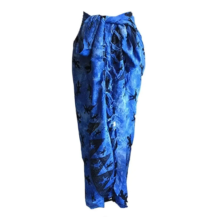 Blue wrap skirt with black batik inspired gecko patterns made from lightweight bali sarong fabric