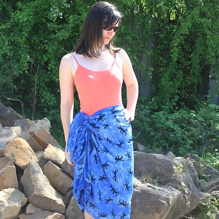Blue wrap skirt with black lizard print made of lightweight fabric from bali sarongs gecko collection