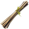 A bundle of natural wood bamboo diffuser sticks tied with a sheer green ribbon showing color choice options