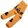 Orange bamboo socks with a playful pattern of black white and brown cartoon dogs for adults