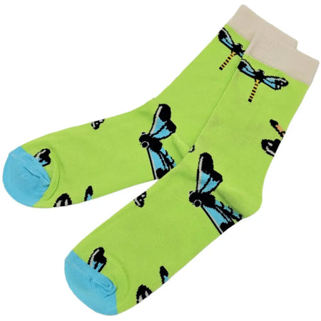 Lime green bamboo socks with a black and light blue dragonfly pattern, beige cuffs, and bright turquoise toes
