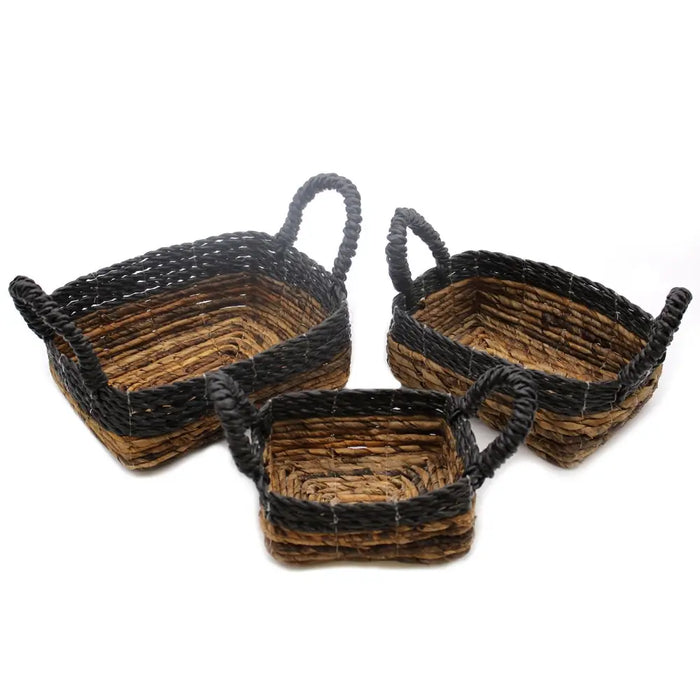 Set of three rectangular woven baskets with natural brown and black striped patterns made from banana leaf and hitam raffia