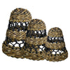 Handwoven banana leaf lamp shades with natural fiber texture and black mesh accents in a set of three