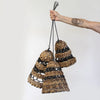 Handwoven banana leaf lamp shades with alternating tan and black raffia bands set of 3 pendant lights