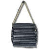 Banjar laptop bag with black and white striped woven fabric and beige interior strap for easy carrying