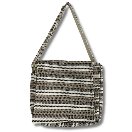 A woven Banjar laptop bag with horizontal black white and beige stripes in cream and grey tones