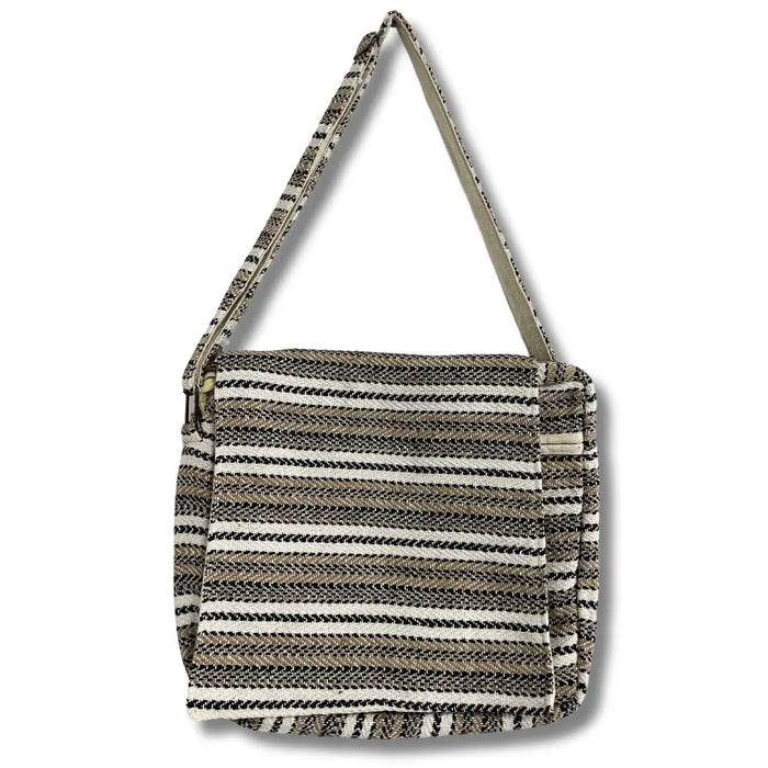 A woven Banjar laptop bag with horizontal black white and beige stripes in cream and grey tones