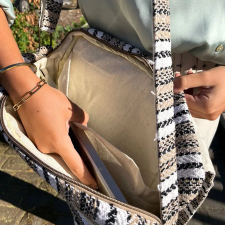 Banjar laptop bag in cream grey with black white and beige herringbone pattern and zipper closure tote style