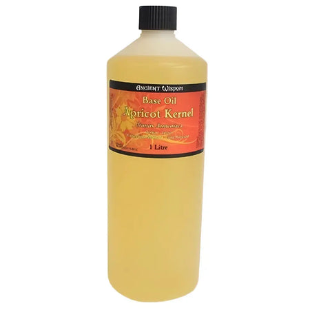 A 1 litre bottle of ancient wisdom apricot kernel base carrier oil with an orange label and black screw top cap