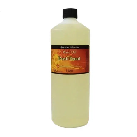 A 1 liter bottle of beach kernel peach kernel base carrier oil with pale yellow liquid and an orange floral label