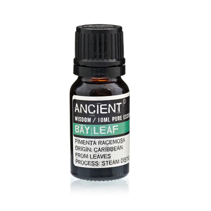 A small dark glass bottle with black cap and white label showing ancient wisdom 10ml pure essential bay leaf oil