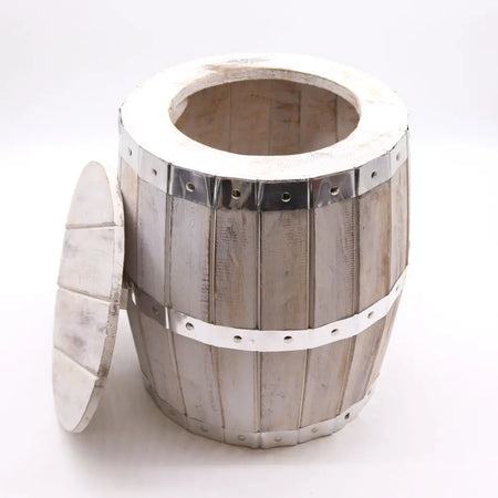 White distressed wood beer barrel stool with silver metal bands and matching lid in a whitewash finish
