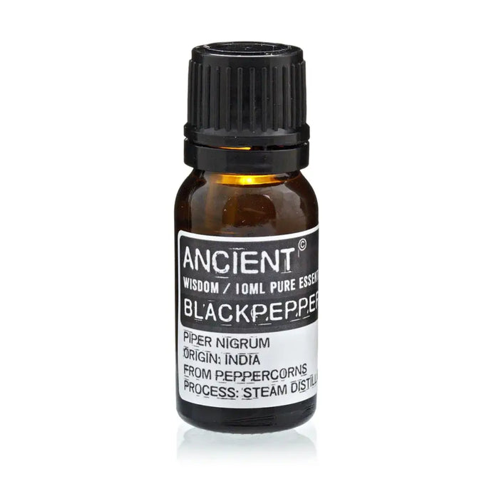 A small amber glass bottle of black pepper essential oil with a black cap and a white ancient wisdom label