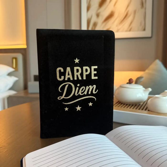 Black velvet notebook with gold foil carpe diem lettering and stars featuring 80 pages for writing or journaling