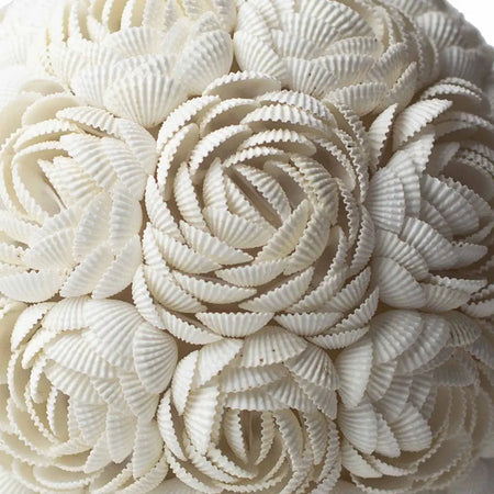 A white ceramic boho sea shell lamp with intricately ridged cupcake liners forming a rose oval 15cm floral pattern