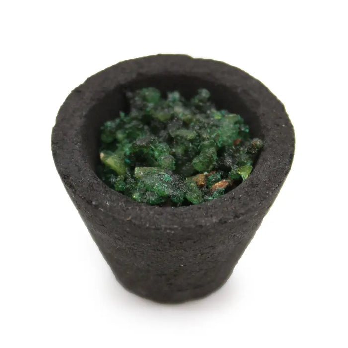 Black ceramic incense burner filled with green white sage incense resin cups for aromatic use in a box of 12