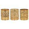 Three brass-finish decorative kasbah tealight holders with intricate cut-out patterns in gold-colored metal