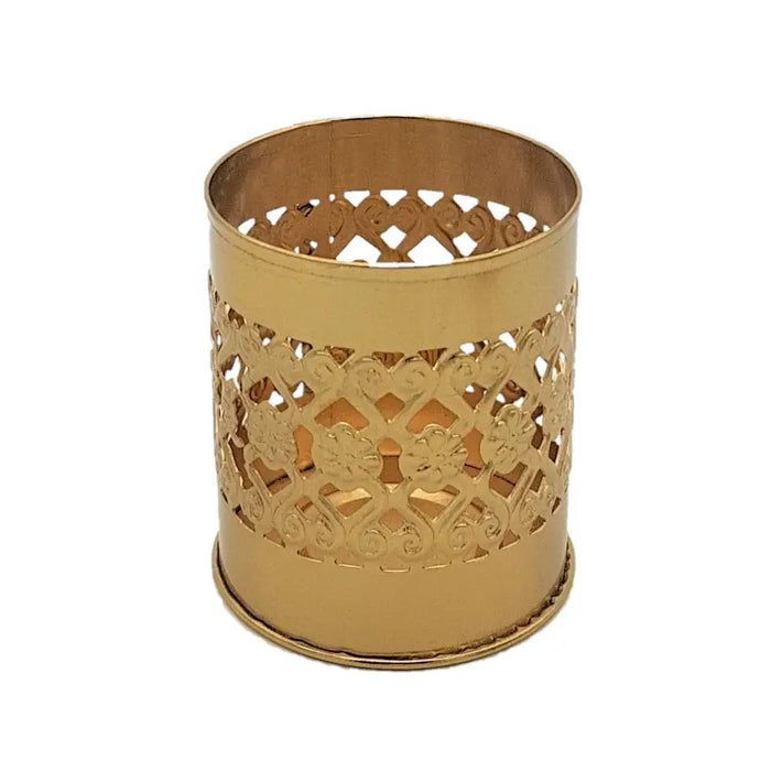 Gold-colored brass finish metal cylindrical tealight holder with intricate floral and scrollwork cutouts kasbah design