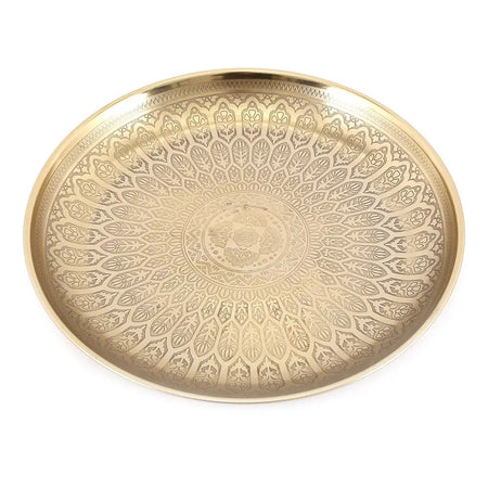 Golden brass-finish decorative tray with intricate floral and geometric kasbah pattern embossed on the surface