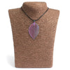 Bravery leaf necklace with a shimmering multi coloured iridescent leaf pendant on a black cord necklace