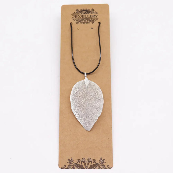 Silver bravery leaf necklace pendant on a black cord showing a detailed leaf shape made of silver metal