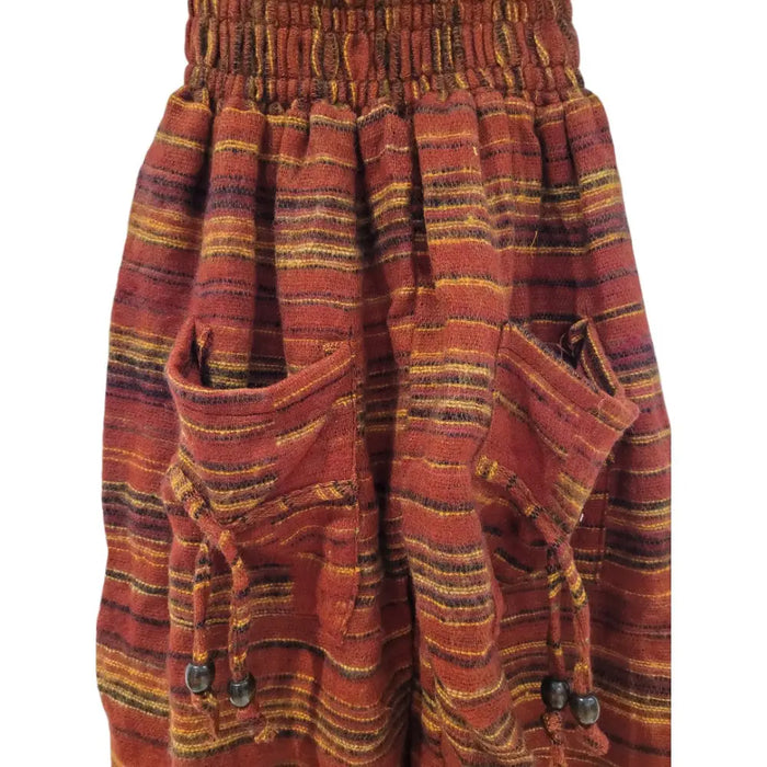A cozy earth toned striped ali baba skirt with gathered waistband and front pockets with dark beaded drawstrings