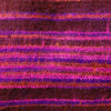 A richly textured scarf with magenta purple and rust stripes paired with brushed cashmelon ali baba trousers