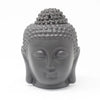 Gray ceramic buddha head oil burner with textured rounded features and a small top opening for head oil use