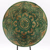 Circular wooden wall art with green mandala design and natural wood grain finish from buddha feng shui set buddha knot