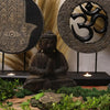 Dark brown wooden buddha feng shui statue with intricate carvings seated in meditation pose for feng shui set