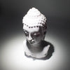 White stone buddha glow lamp bust with detailed curls and serene face featuring lavender crackle finish