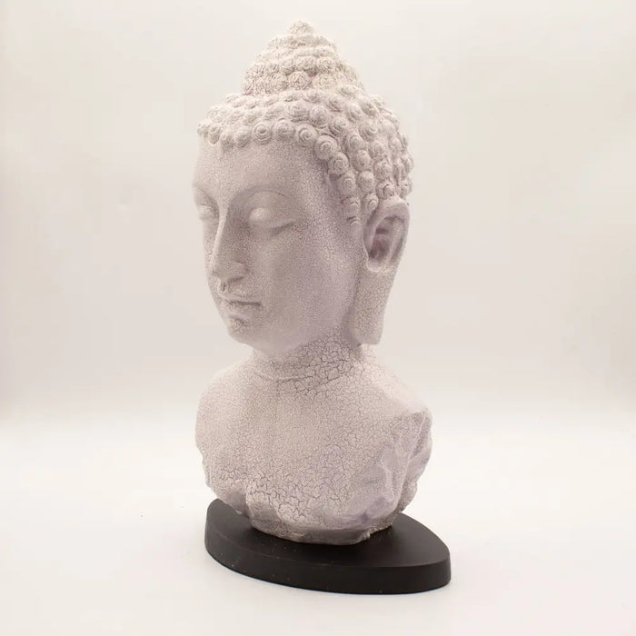 Gray stone buddha bust lamp with textured cracked surface and detailed curls featuring lavender crackle finish