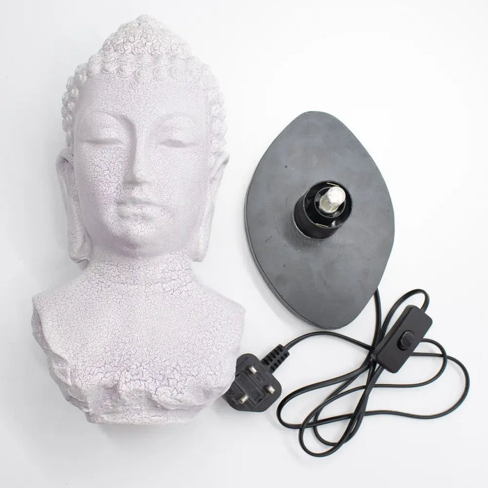 White cracked-finish buddha head lamp with lavender crackle effect on black base and cord
