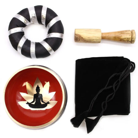 Red singing bowl set with gold lotus and buddha silhouette design in black and orange meditation bowl set