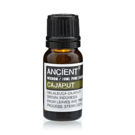 A small amber glass bottle with black cap labeled ancient wisdom 10ml pure essential cajaput oil from indonesia