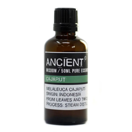 A dark amber glass bottle of cajuput essential oil 50ml with a black cap and allergen declarations on the label