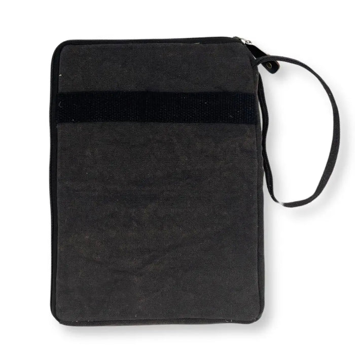 Black canvas laptop travel pouch with zipper closure and wrist strap in stonewash charcoal color