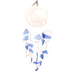 A capiz shell and glass wind chime with a white rounded top and hanging blue and clear sea glass shards