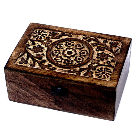 Carved mango wood aromatherapy box with floral patterns dark brown finish and black latch holds 24 essential oils