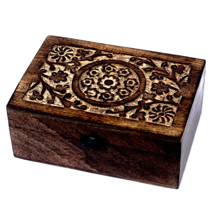 Carved mango wood aromatherapy box with floral patterns dark brown finish and black latch holds 24 essential oils